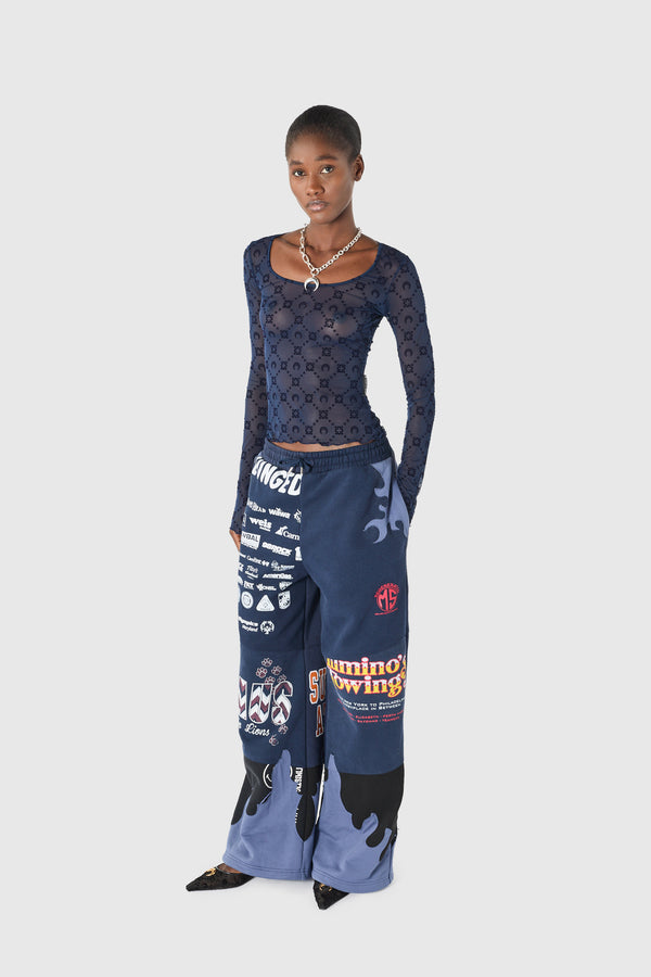 Upcycled jersey pants with flowers patches